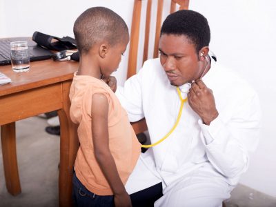 60747351 - doctor is consulting the child in his office